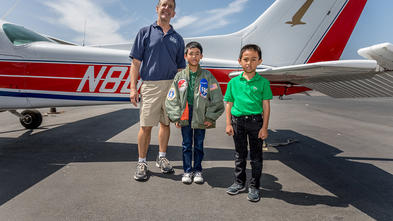 Kyer with his brother and pilot