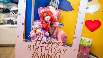 Amina with birthday banner