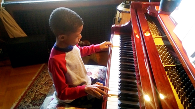 Wish Kid Kai at piano