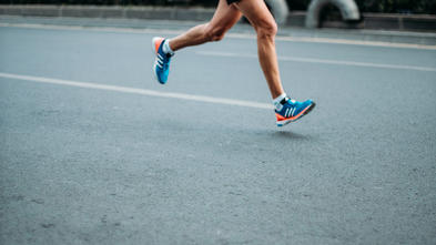 Runner on city street