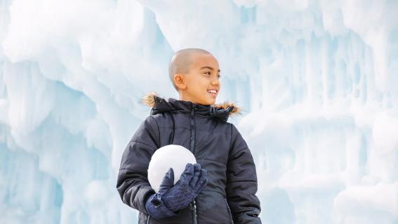 wish kid Shore holds a giant snowball