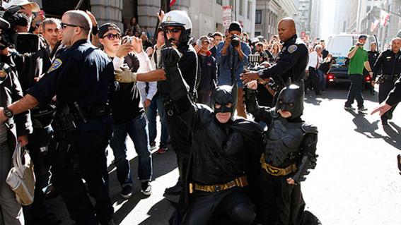 Batman and Batkid in the street