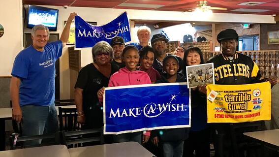 Volunteers and Wish kid Khalel
