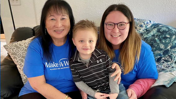 Volunteers and Wish kid Tyson