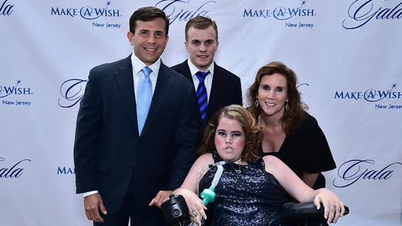 John Crowley, Chairman and Chief Executive Officer of Amicus Therapeutics, Inc. and former National Board Chair for Make-A-Wish America, with his son John Crowley, Jr., daughter and wish kid Megan Crowley, and wife Aileen Crowley