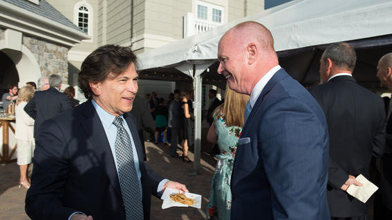 Make-A-Wish New Jersey President & CEO Tom Weatherall greets CareOne CEO and Humanitarian of the Year Daniel Straus