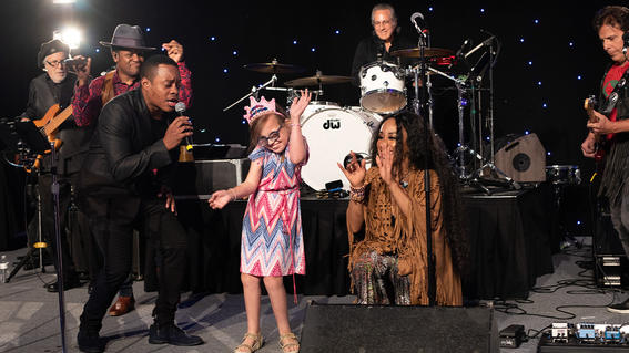 Wish kid Mary dances with Max Weinberg of the E-Street Band and Special Friends
