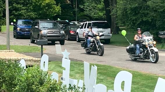 Green Mountain Tech hosted a wish reveal for wish kid Warner. The employees designed a custom video game to reveal this his wish for a new gaming setup was granted!