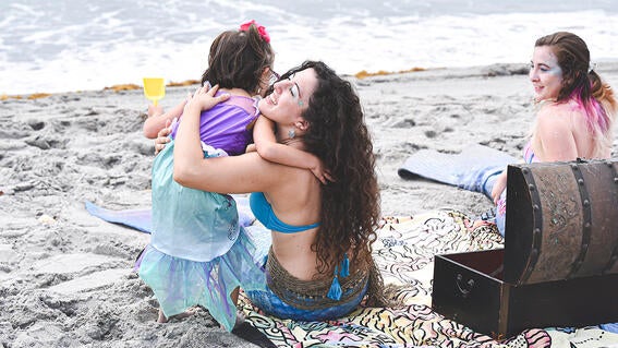 Lilli hugs her new mermaid friend