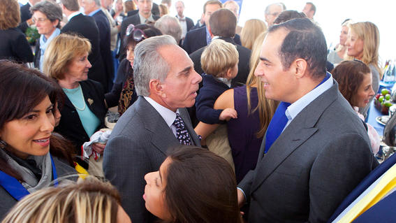 Joe Plumeri greets guest at Wishing Place grand opening