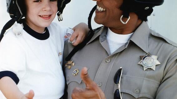 Oregon's First Wish, child with policeman