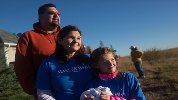 Wish kid Teagan and her parents