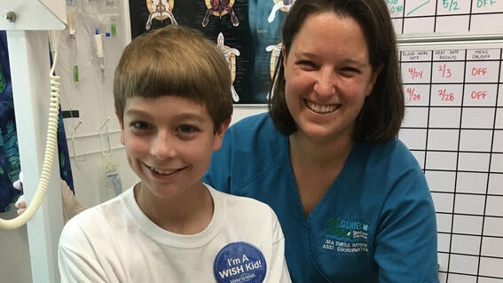 Keeton with staff
