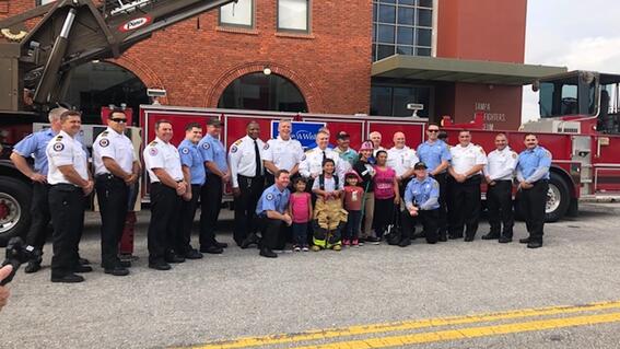 Samuel with firemen