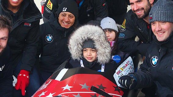 Wish kid Tiago and U.S Bobsled Team