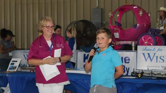 boy on mic at BBQ