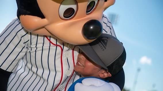 Jaxon hugs Mickey