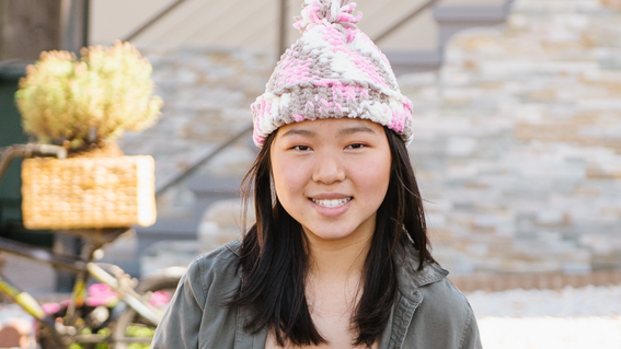 natalie poses in her hat