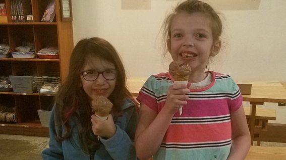 Mimms and Carleigh enjoy ice cream cones together. 