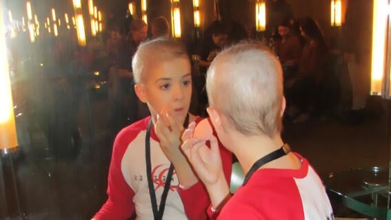 Steph putting on make up