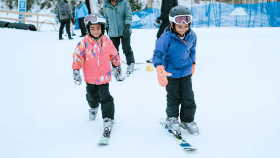 Wish kid Iris and her sister play in the snow
