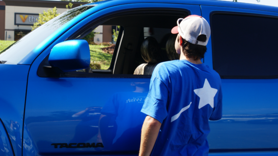 Michael peers inside his truck to view the revamped interior.