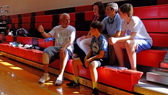 Wish Kid Will with UNC Head Coach Roy Williams on his wish to go to the Maui Jim Invitational in Hawaii