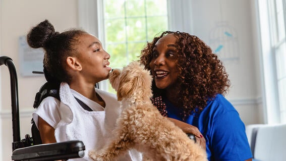 Wish kid Shanya and Barbara with Fluffy