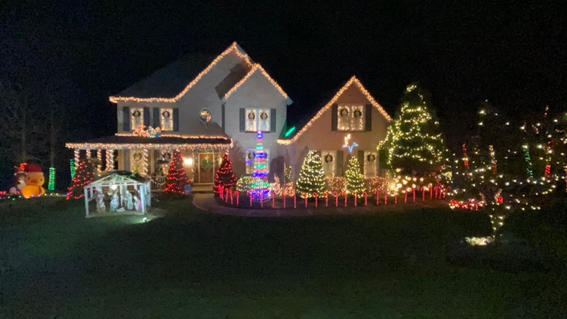 The Hunkele Family Home covered in holiday lights.