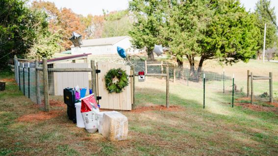 The goat pen and supplies.