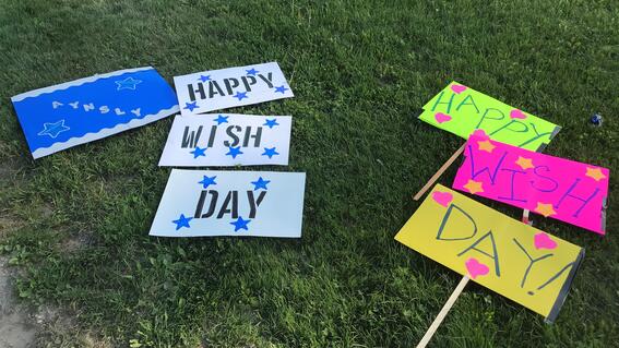 Handmade signs on a lawn