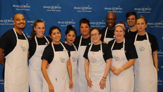 Wish Alumni Ryan today with a group of friends volunteering at an event