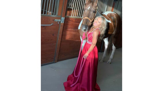 Volunteeer Brookley and her horse dressed up for wishes