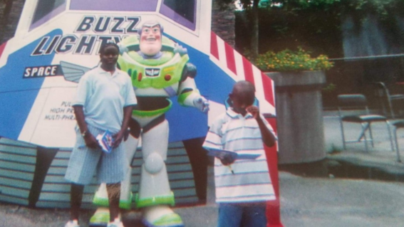 Tyler with brother and Buzz