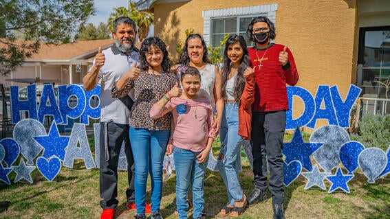 wish kid allison with family