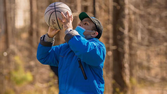 Luke shooting a basketball
