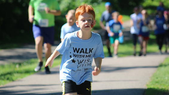 Wish kid David running at Walk For Wishes Twin Cities 2019