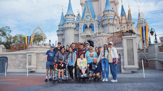Lincoln and family in front of Cinderella's Castle