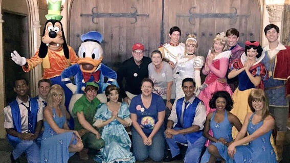 Wish kid Ellison with all the Disney characters