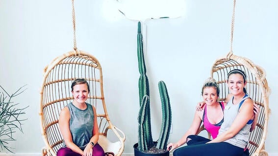 Young Pros members hosting a yoga fundraiser