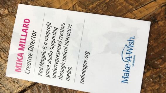 Business card printed with Mika's information and title
