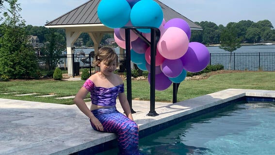 Emma in her mermaid tail