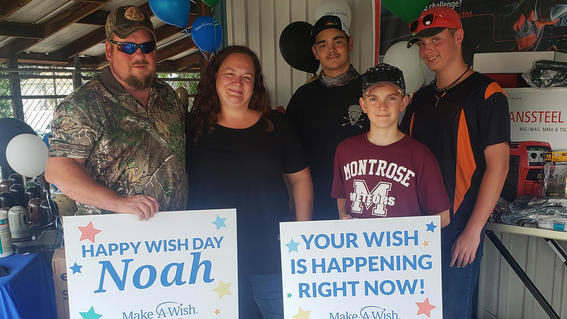 Noah and his family on the day of his wish.