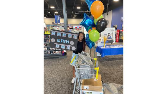 Carrington at Best Buy during her wish. 