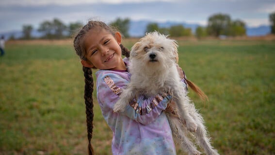 Annie posing with man's best friend.