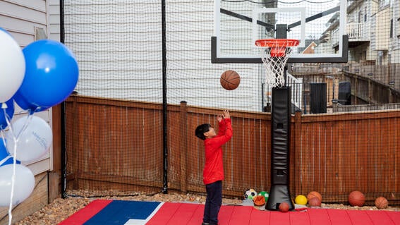 Zain shooting hoops