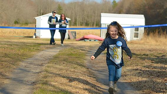 Lana runs to see her new boat