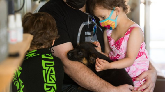 Berkeley bonding with her dog.