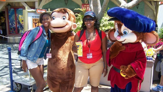 Jakeina and her mom with characters at Hollywood Studios
