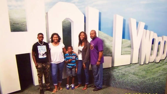 Jakeina and her family in front of the Hollywood sign on her wish trip